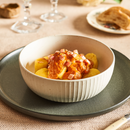 Ñoquis de sémola con salsa rosso y jamón